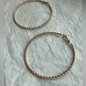 Large gold-toned hoop earrings